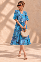 Iris™ | Luchtige Buikcamouflerende Midi-jurk met Print
