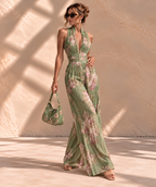 Camellia™ | Halter Jumpsuit met Bloemenprint en Wijde Pijpen